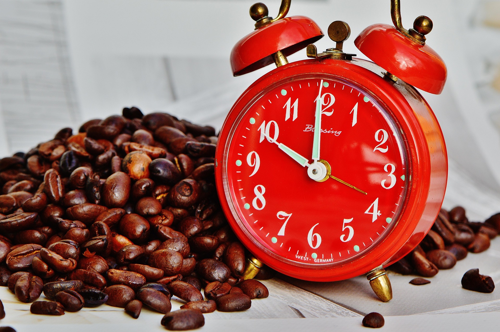 coffee beans with red old fashion clock